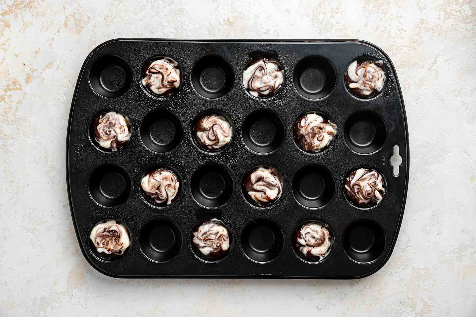 https://www.dessertfortwo.com/wp-content/uploads/2010/09/Cheesecake-Brownie-Bites-8.jpg